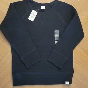 All black quilted sweater from Gap.
